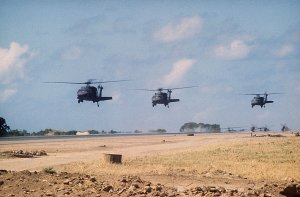 1024px-UH-60As_over_Port_Salines_airport_Grenada_1983f.JPEG